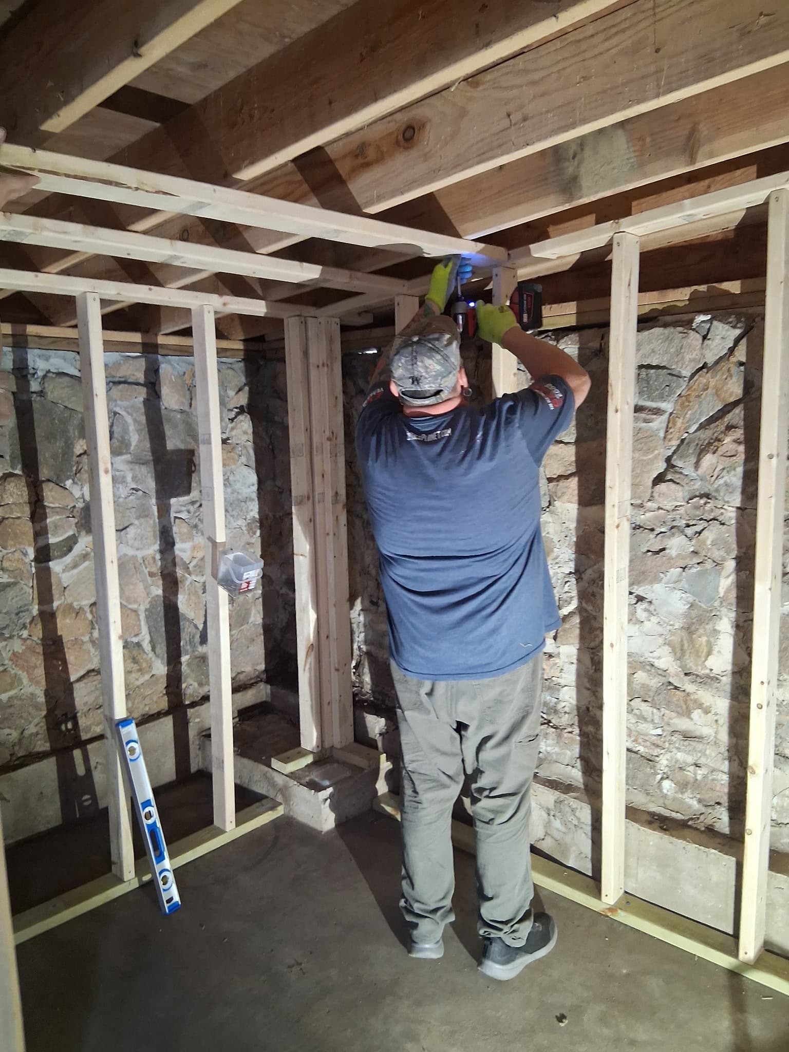 Framed room preparation for a sauna installation.