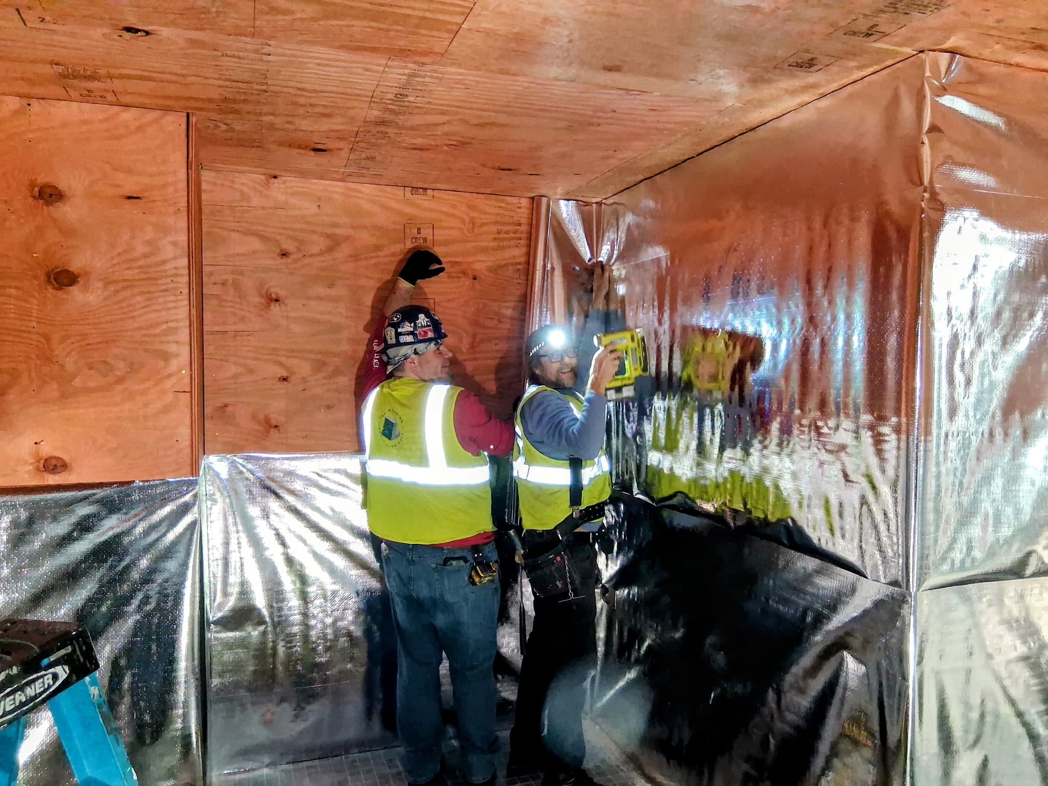 Sauna room under construction with reflective insulation.